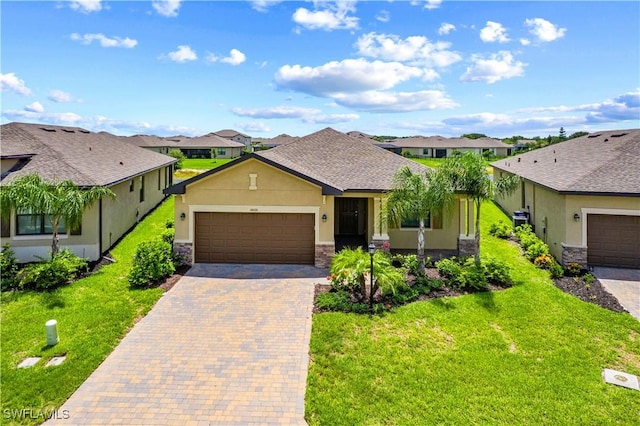 14688 Cantabria Dr, Fort Myers, FL 33905 - view of front of home with a residential view, stucco siding, stone siding, decorative driveway, and an attached garage