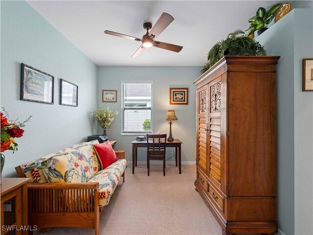 17857 Woodland Ct, Punta Gorda, FL 33982 - living area with a ceiling fan and light carpet