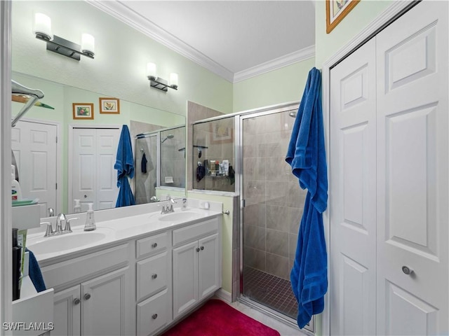 17857 Woodland Ct, Punta Gorda, FL 33982 - full bathroom featuring a shower stall, double vanity, and ornamental molding