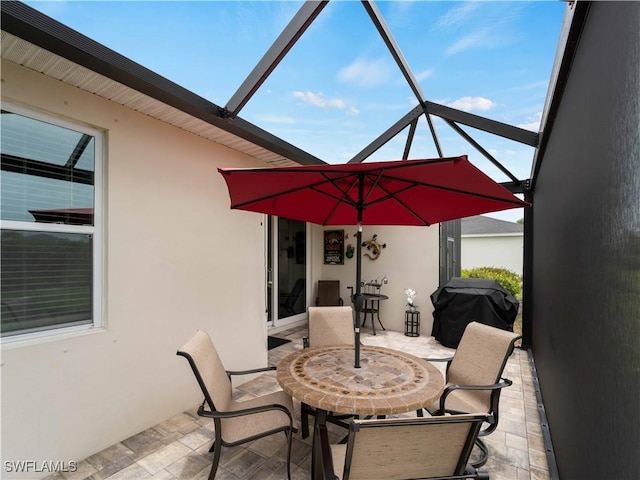 17857 Woodland Ct, Punta Gorda, FL 33982 - view of patio with area for grilling and glass enclosure