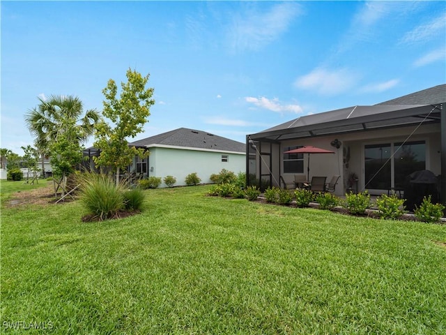 17857 Woodland Ct, Punta Gorda, FL 33982 - view of green lawn with a lanai and a patio area