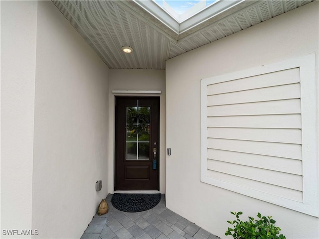 17857 Woodland Ct, Punta Gorda, FL 33982 - view of exterior entry with stucco siding