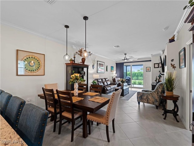 17857 Woodland Ct, Punta Gorda, FL 33982 - dining room with crown molding, a ceiling fan, and light tile patterned flooring