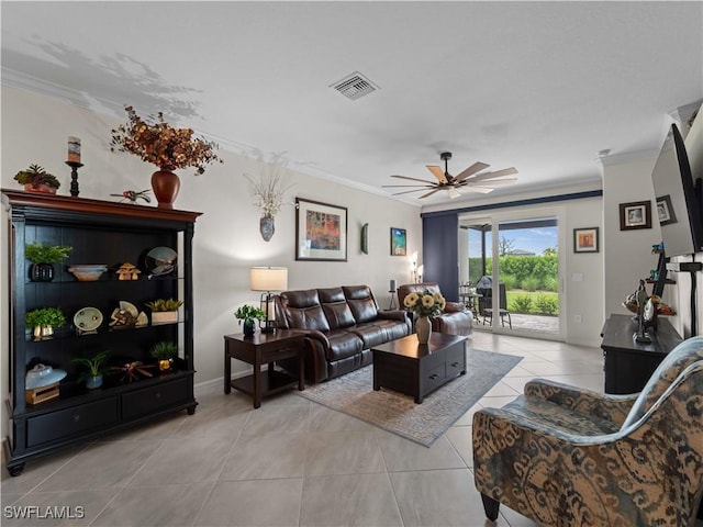 17857 Woodland Ct, Punta Gorda, FL 33982 - living area featuring ornamental molding, tile patterned floors, and a ceiling fan