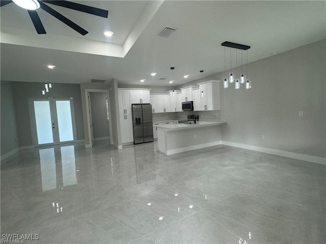 3003 18th St W, Lehigh Acres, FL 33976 - kitchen featuring appliances with stainless steel finishes, open floor plan, ceiling fan, light countertops, and recessed lighting