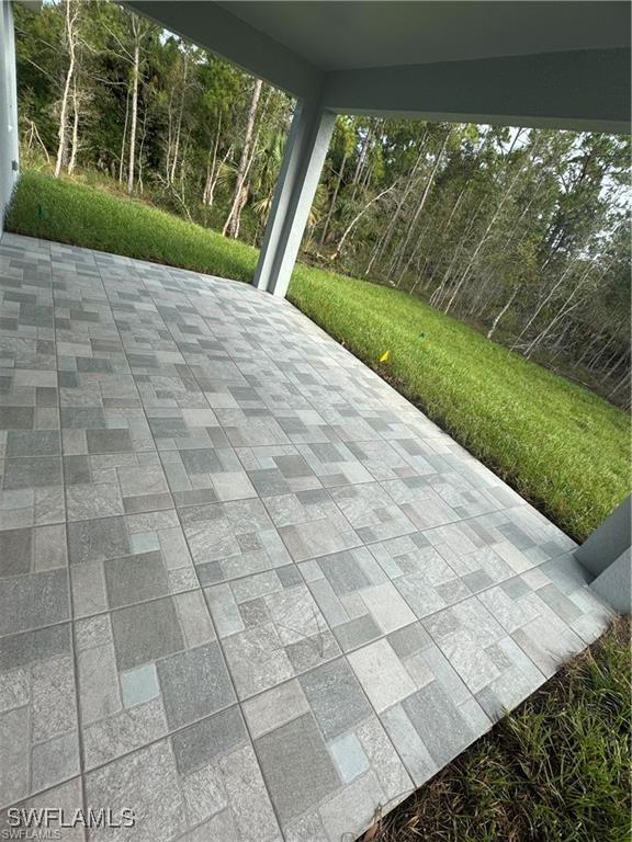 3003 18th St W, Lehigh Acres, FL 33976 - view of patio / terrace