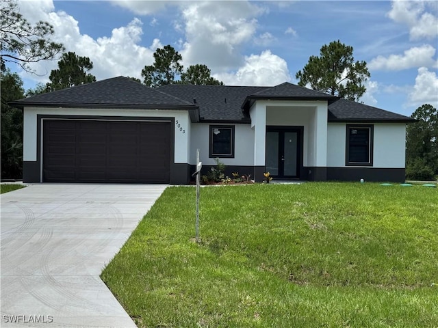 3003 18th St W, Lehigh Acres, FL 33976 - prairie-style house featuring stucco siding, driveway, and a garage