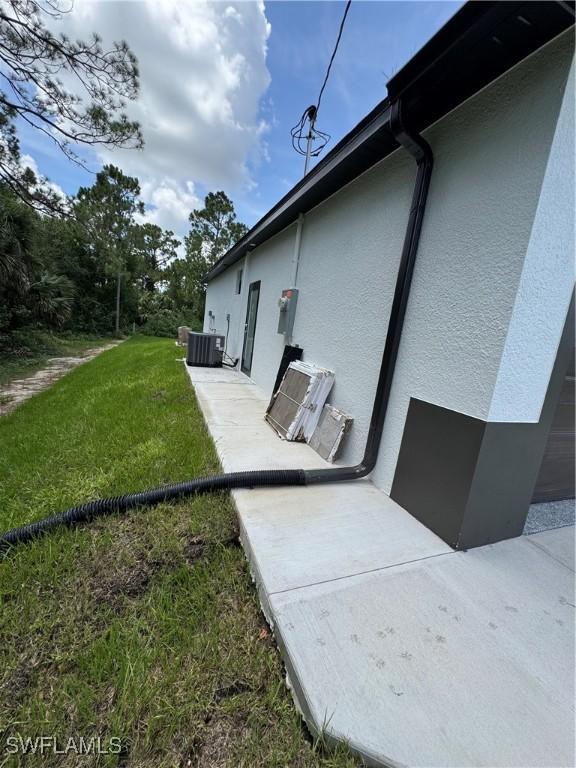 3003 18th St W, Lehigh Acres, FL 33976 - view of green lawn