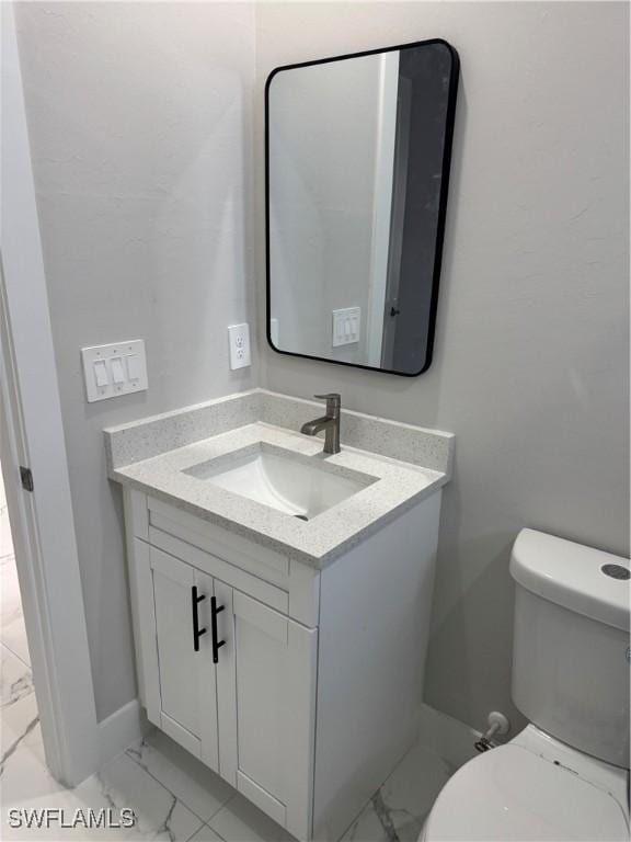 3003 18th St W, Lehigh Acres, FL 33976 - bathroom with marble look tile flooring and vanity