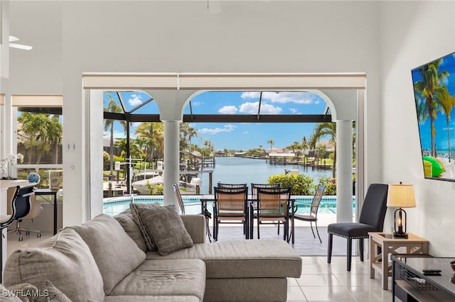 3925 Oasis Blvd, Cape Coral, FL 33914 - living area featuring light tile patterned floors and a high ceiling