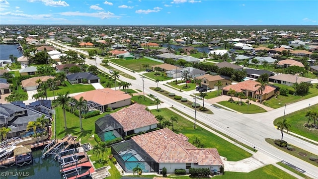 3925 Oasis Blvd, Cape Coral, FL 33914 - aerial perspective of suburban area featuring a nearby body of water