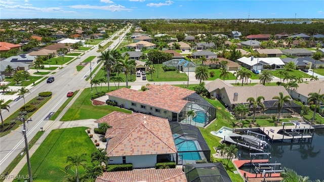 3925 Oasis Blvd, Cape Coral, FL 33914 - aerial perspective of suburban area with a nearby body of water