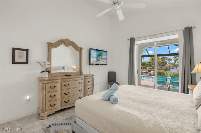 3925 Oasis Blvd, Cape Coral, FL 33914 - bedroom with access to exterior, a ceiling fan, and a towering ceiling