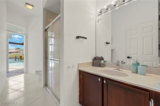 3925 Oasis Blvd, Cape Coral, FL 33914 - bathroom with vanity, a stall shower, and tile patterned flooring