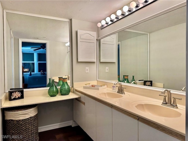7390 Estero Blvd Unit 702, Fort Myers Beach, FL 33931 - bathroom with double vanity and ceiling fan