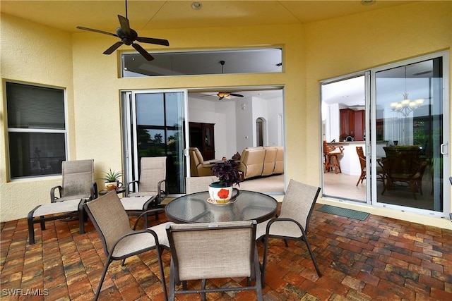 8871 Biella Ct, Estero, FL 33967 - view of patio with ceiling fan and outdoor dining space