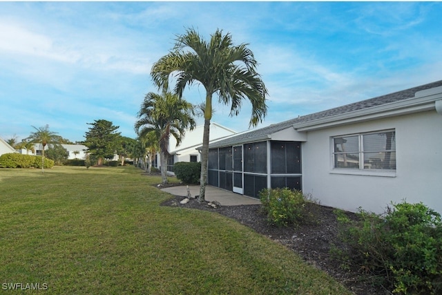 8780 Lueck Ln Unit 4, Fort Myers, FL 33919 - view of grassy yard featuring a sunroom