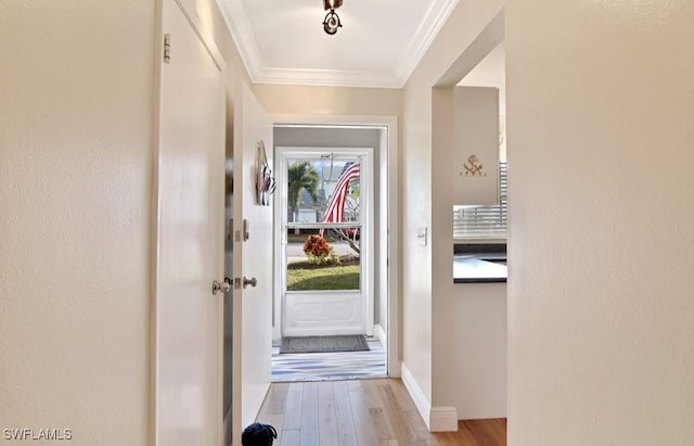 8780 Lueck Ln Unit 4, Fort Myers, FL 33919 - entryway featuring ornamental molding, light wood-style flooring, and baseboards