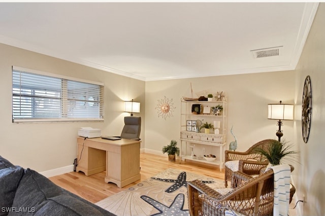 8780 Lueck Ln Unit 4, Fort Myers, FL 33919 - home office with ornamental molding, light wood-type flooring, and baseboards