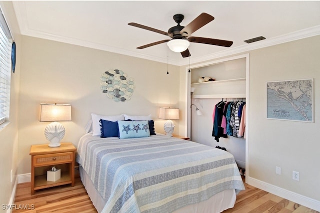 8780 Lueck Ln Unit 4, Fort Myers, FL 33919 - bedroom with wood finished floors, baseboards, crown molding, a closet, and a ceiling fan