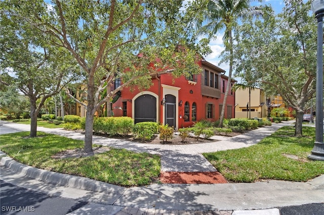 9114 Chula Vista Ln Unit 11901, Naples, FL 34113 - view of front of home featuring stucco siding