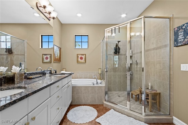 9114 Chula Vista Ln Unit 11901, Naples, FL 34113 - full bathroom featuring a garden tub, double vanity, a stall shower, tile patterned floors, and recessed lighting