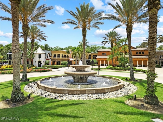 9114 Chula Vista Ln Unit 11901, Naples, FL 34113 - surrounding community featuring a lawn