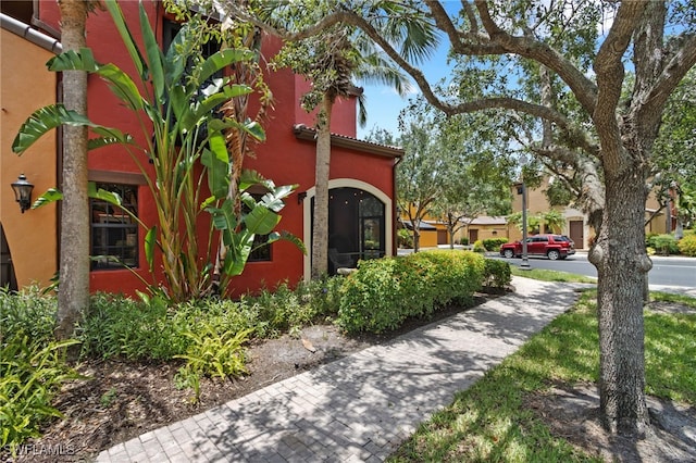 9114 Chula Vista Ln Unit 11901, Naples, FL 34113 - view of side of home with stucco siding