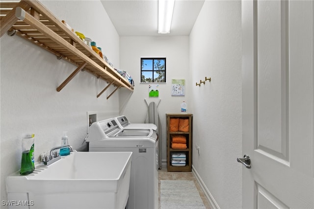 9114 Chula Vista Ln Unit 11901, Naples, FL 34113 - washroom featuring independent washer and dryer and baseboards