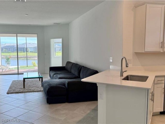 2011 Vermont Ln, Naples, FL 34120 - living area with light tile patterned floors