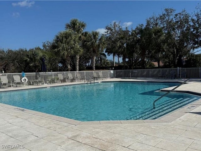 2011 Vermont Ln, Naples, FL 34120 - community pool featuring a patio area