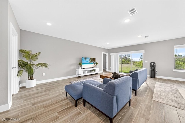 2008 NW 24th Pl, Cape Coral, FL 33993 - living area featuring light wood-type flooring and recessed lighting