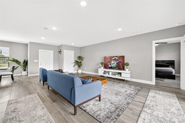 2008 NW 24th Pl, Cape Coral, FL 33993 - living area featuring wood finished floors and recessed lighting