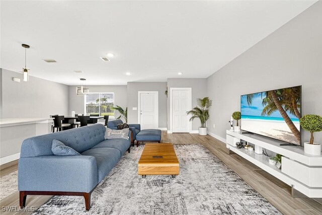 2008 NW 24th Pl, Cape Coral, FL 33993 - living room with wood finished floors and recessed lighting