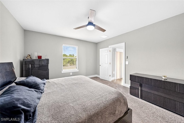 2008 NW 24th Pl, Cape Coral, FL 33993 - carpeted bedroom featuring baseboards and ceiling fan