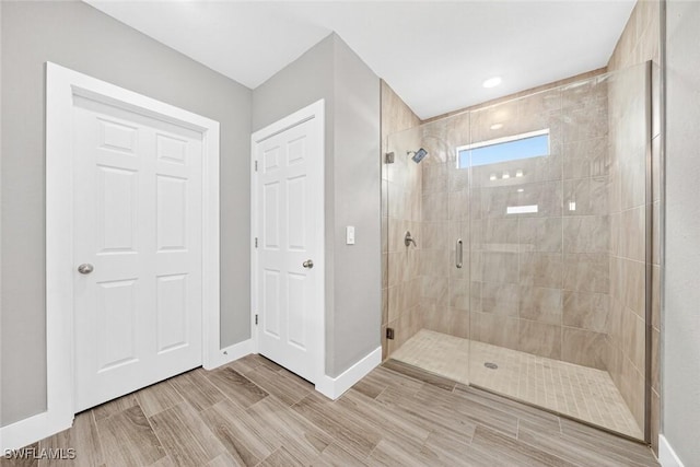2008 NW 24th Pl, Cape Coral, FL 33993 - bathroom with a shower stall and wood finished floors