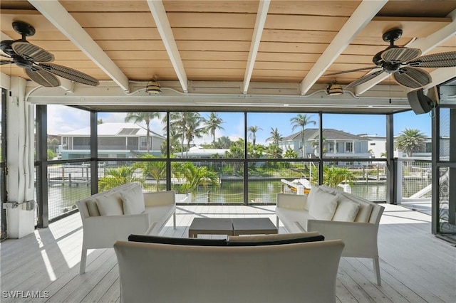 370 Bayland Rd, Fort Myers Beach, FL 33931 - sunroom featuring a ceiling fan, an outdoor hangout area, and beamed ceiling