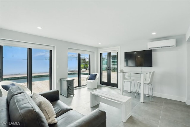 370 Bayland Rd, Fort Myers Beach, FL 33931 - living area with a wall mounted AC, french doors, and recessed lighting