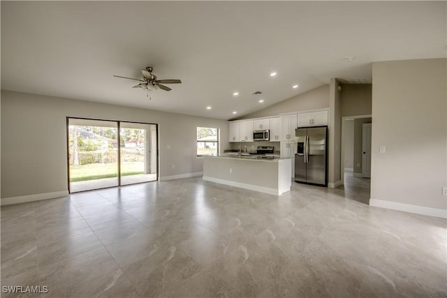4114 2nd St SW, Lehigh Acres, FL 33976 - unfurnished living room with ceiling fan, vaulted ceiling, and recessed lighting