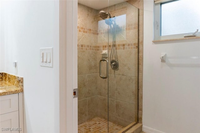 3430 27th Ave SW, Naples, FL 34117 - bathroom with a shower stall and vanity