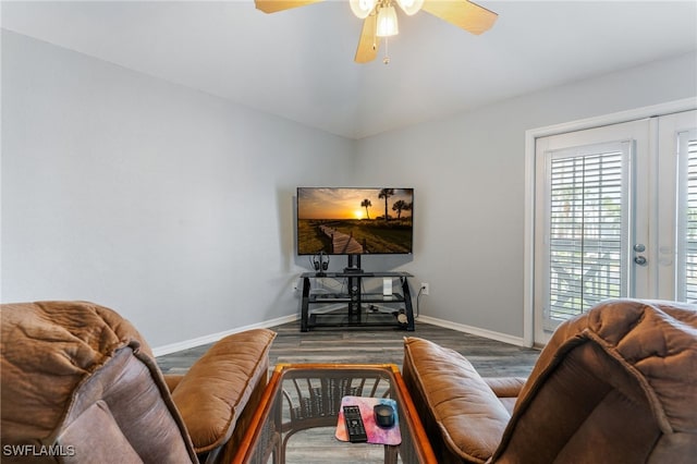 950 Moody Rd Unit 124, North Fort Myers, FL 33903 - living area featuring wood finished floors, a ceiling fan, baseboards, and vaulted ceiling