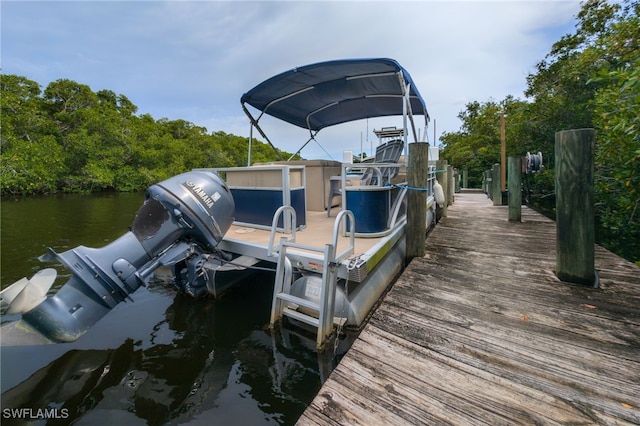 950 Moody Rd Unit 124, North Fort Myers, FL 33903 - dock featuring boat lift and a water view