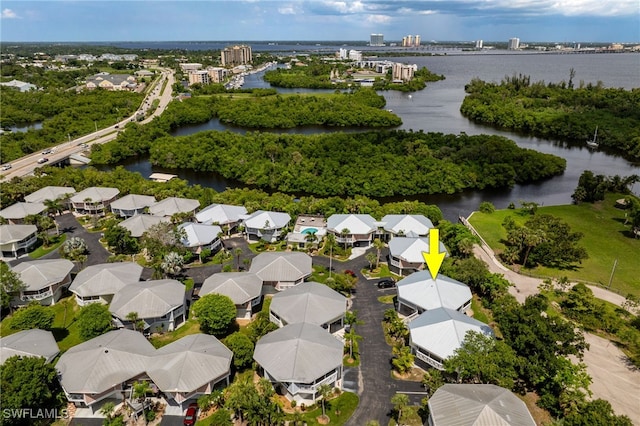 950 Moody Rd Unit 124, North Fort Myers, FL 33903 - aerial perspective of suburban area featuring a large body of water and a notable bridge