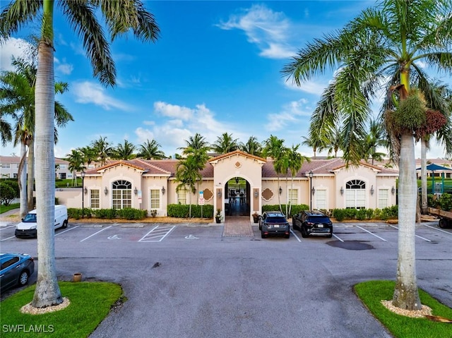 3940 Cherrybrook Loop, Fort Myers, FL 33966 - view of property featuring uncovered parking