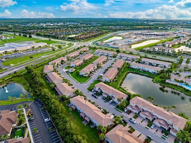 3940 Cherrybrook Loop, Fort Myers, FL 33966 - aerial overview of property's location with a nearby body of water and nearby suburban area