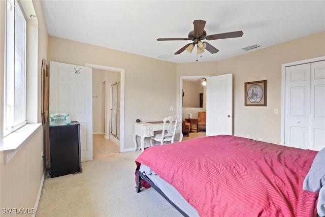 3940 Cherrybrook Loop, Fort Myers, FL 33966 - bedroom with a closet, light carpet, and ceiling fan