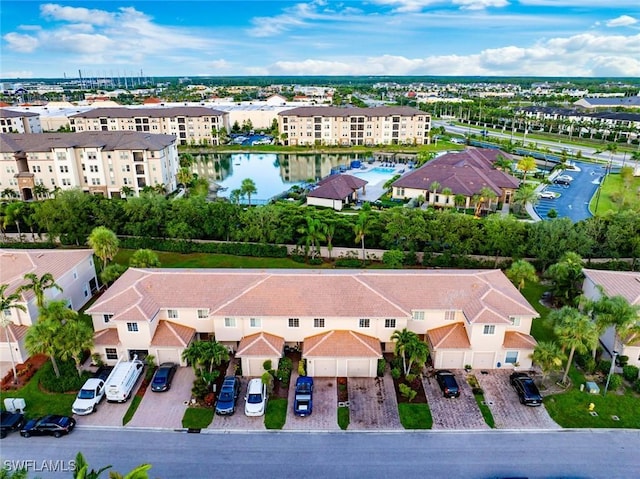3940 Cherrybrook Loop, Fort Myers, FL 33966 - aerial perspective of suburban area featuring a large body of water