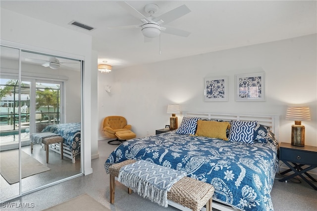 2749 Bruce St, Matlacha, FL 33993 - bedroom featuring speckle patterned floor, access to exterior, a ceiling fan, and a closet