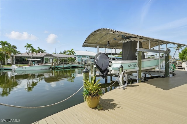 2749 Bruce St, Matlacha, FL 33993 - dock featuring boat lift and a water view
