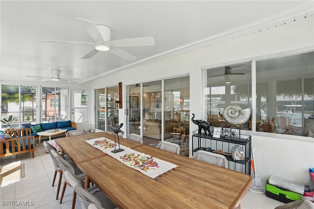 2749 Bruce St, Matlacha, FL 33993 - sunroom / solarium featuring ceiling fan, outdoor dining area, and an outdoor hangout area